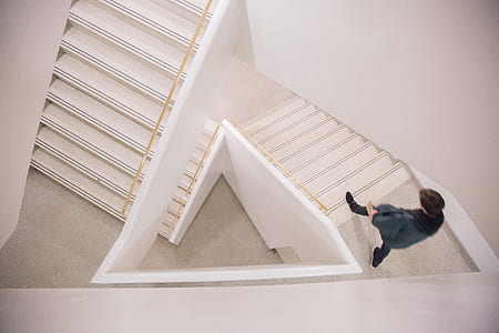 man walking down on stairway thumbnail