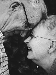 old man and woman smiling to each other thumbnail