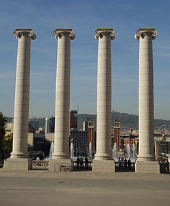 four gray concrete pillars thumbnail