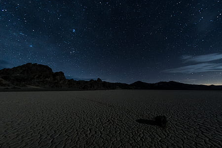 silhouette of mountain during night thumbnail