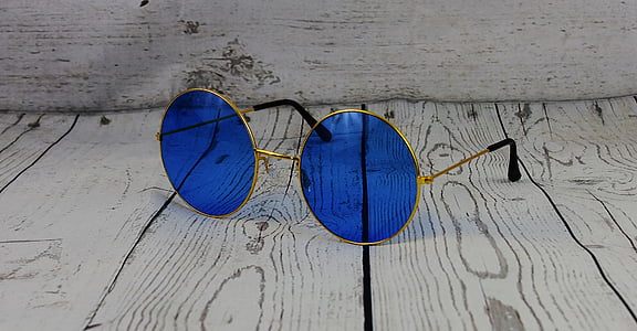 blue sunglasses with gold frames thumbnail