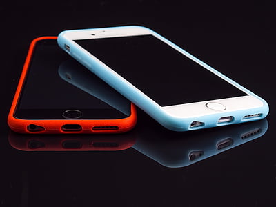 two teal and orange iPhone cases thumbnail