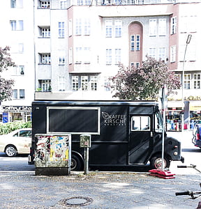 black Kappee Kirsche truck parked near sidewalk thumbnail