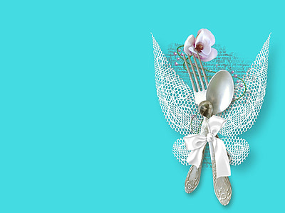 spoon and fork with white ribbon thumbnail