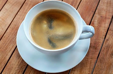 cup of tea on white ceramic saucer thumbnail