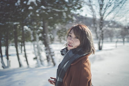 Photography of a Woman Wearing Gray Scarf thumbnail