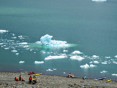 people standing in front of seashore thumbnail