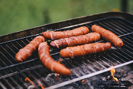 Pork and sausage on the grill thumbnail