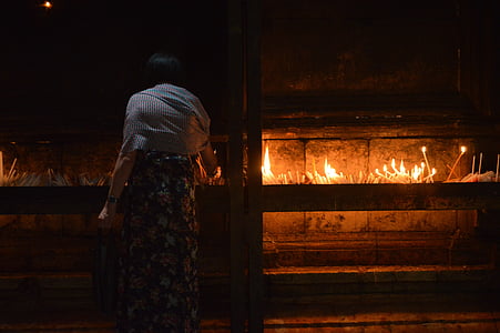 woman holding candle thumbnail