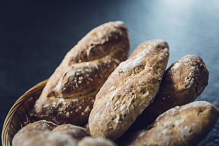 selective focus photography of bread in basket thumbnail