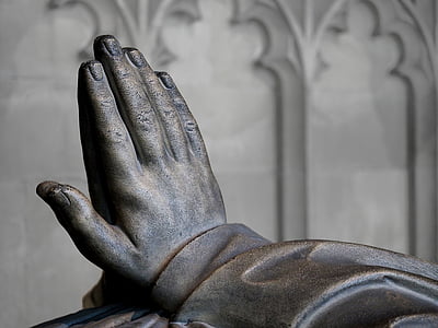 close-up photo of hand statue thumbnail