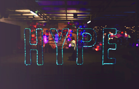 green hype LED signage during nighttime thumbnail