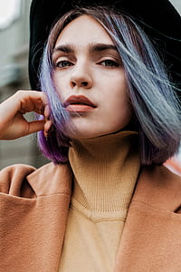 woman wearing brown turtleneck coat thumbnail