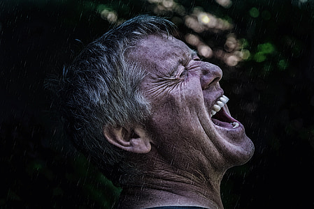 closeup photography of man sticking his mouth open thumbnail