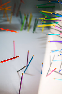 Pencils and crayons sticking out of the walls and floors thumbnail