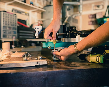 person using gray steel screwdriver thumbnail