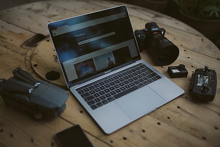 silver laptop on table thumbnail