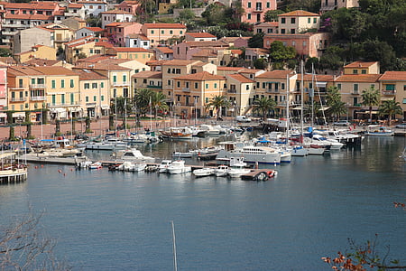 boats on body of water during daytime thumbnail