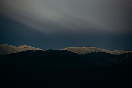 mountains under blue skies thumbnail