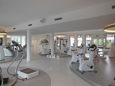 white stationary bike and vibrating plate thumbnail