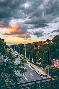 Photo of Concrete Road With Gray Clouds thumbnail
