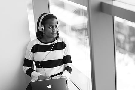 Photography of Woman Listening to Music thumbnail