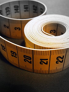 yellow and black tape measure on gray surface thumbnail