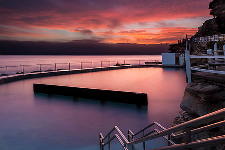pool with fog during sunrise thumbnail