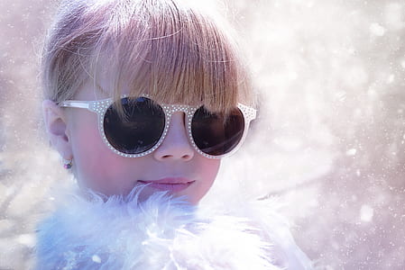 close up photo of girl wearing sunglasses thumbnail