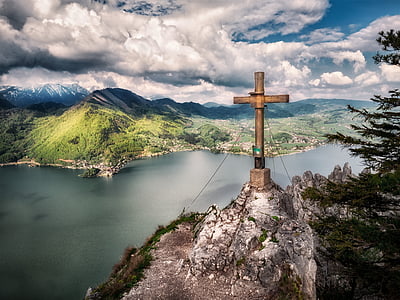 aerial photo of cross near cliff thumbnail
