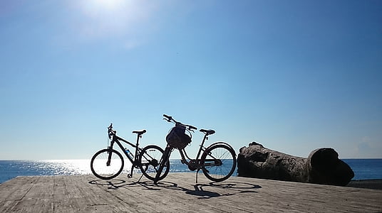 two mountain bicycles on dock thumbnail
