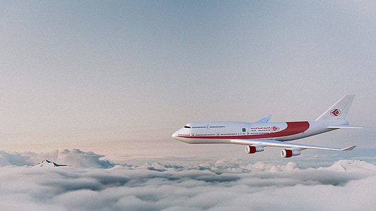 white and red airplane above clouds thumbnail