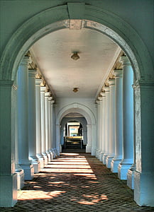 landscape photo of straight pathway with columns thumbnail