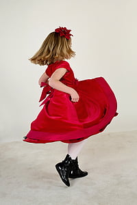 girl wearing red cap-sleeved midi dress thumbnail