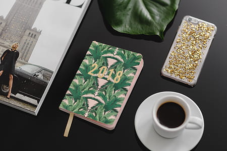 Top view of black table with 2018 calendar agenda thumbnail