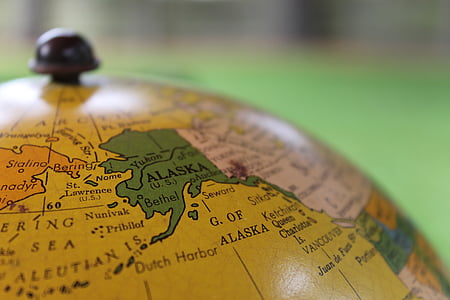 macro photography of desk globe thumbnail
