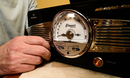 person holding boombox thumbnail