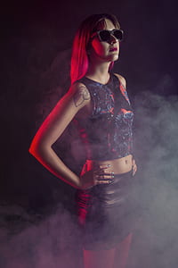 photography of woman wearing black sleeveless crop top with smoky effects thumbnail
