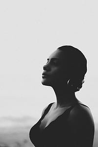 side-view photo of woman wearing sleeveless top thumbnail