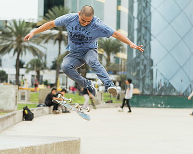 man doing tricks on skateboarding during daytime thumbnail