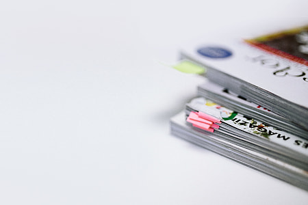 Stack of white magazines with copy space thumbnail
