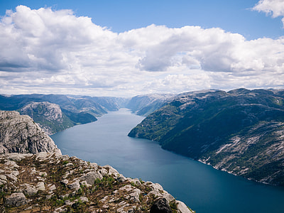 scenery of a body of water between a mountain rainges thumbnail
