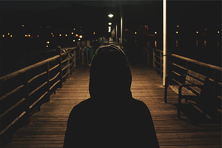 man standing on bridge thumbnail