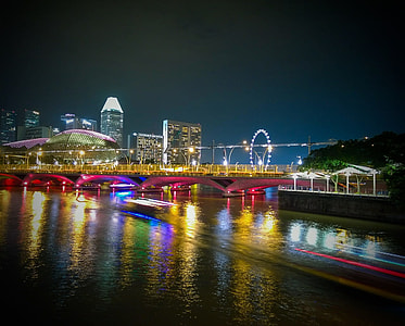 yellow, red and white bridge photo during night time thumbnail