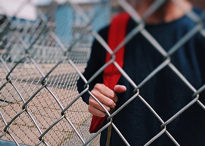 person holding a backpack thumbnail