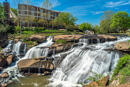 waterfalls near building thumbnail
