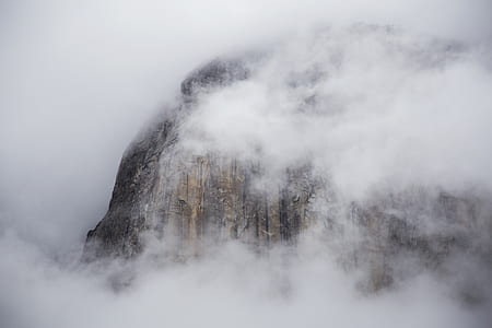 mountain surrounded by clouds thumbnail