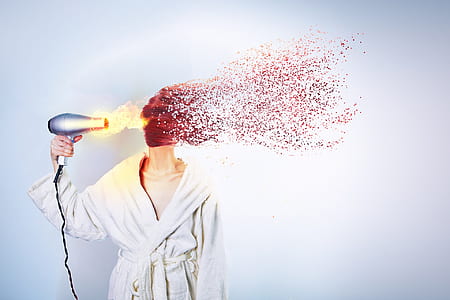 photo of woman holding gray hair dryer illustration thumbnail