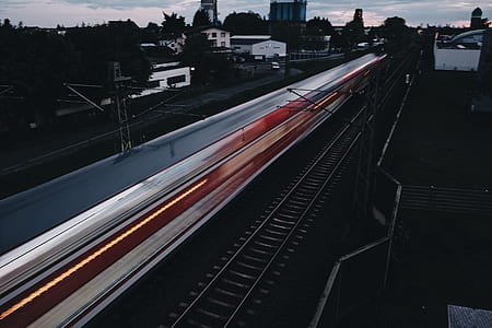 time-lapse photography of train during day thumbnail