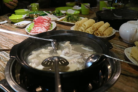 Food With Broth on Black Pot thumbnail